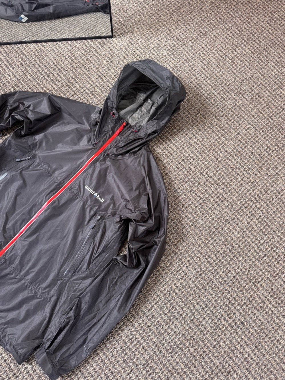 Montbell Black Hooded Windbreaker with Red Zip